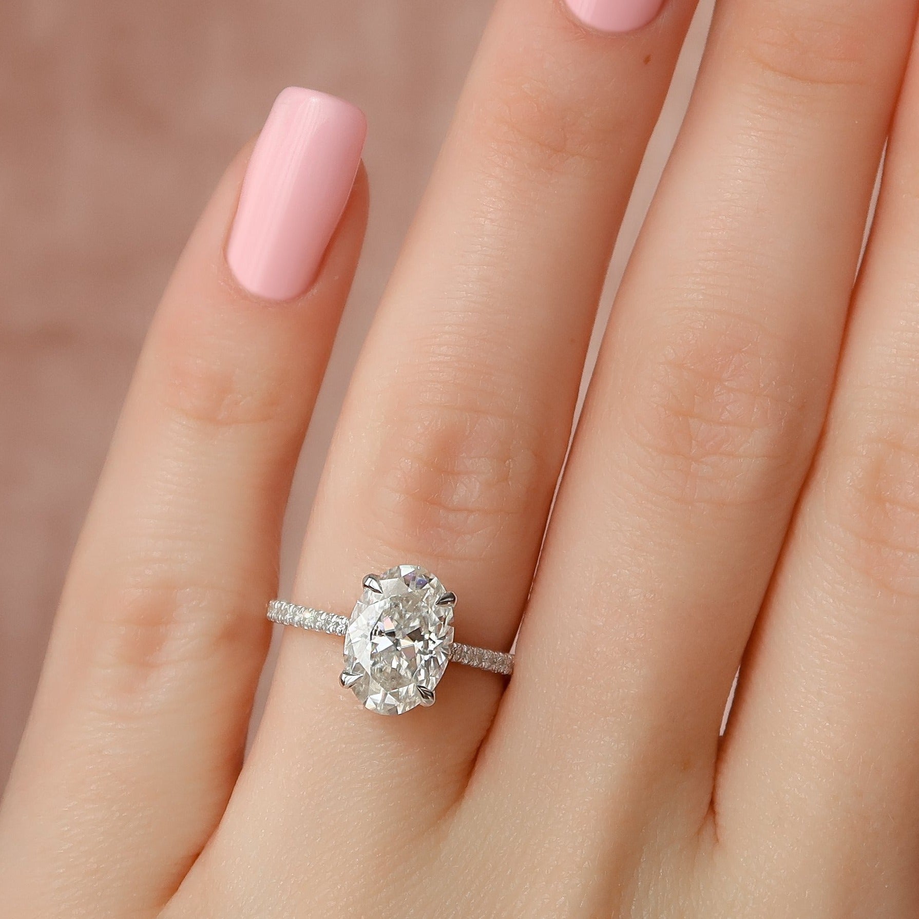 Oval Cut Diamond Hidden Halo Cathedral Ring