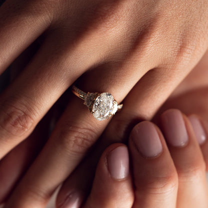 Oval Cut With Half Moon Three Diamond Ring