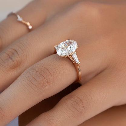  Oval And Tapered Baguette Diamond Ring