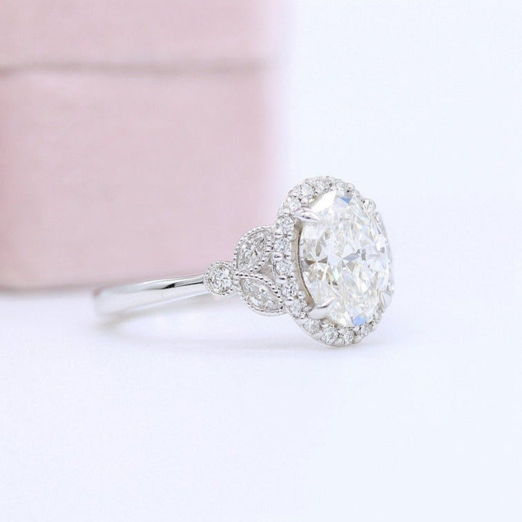 14K Oval Cut Solitaire Accent Halo Ring