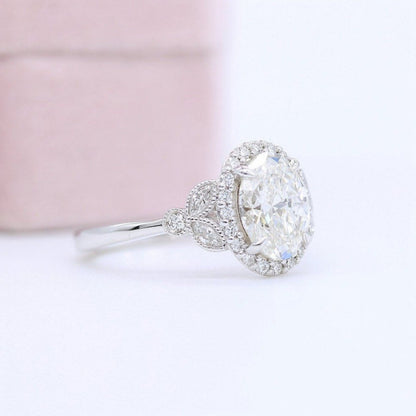 14K Oval Cut Solitaire Accent Halo Ring