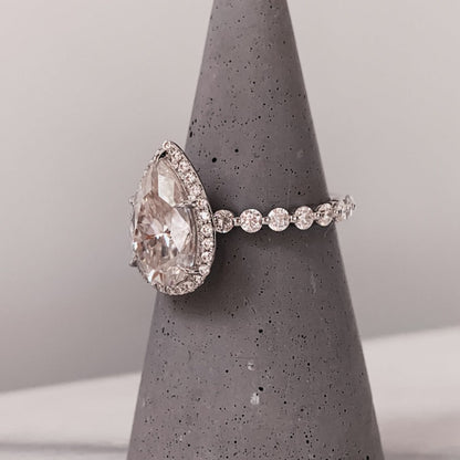 10k Pear Shaped Moissanite Ring With Halo