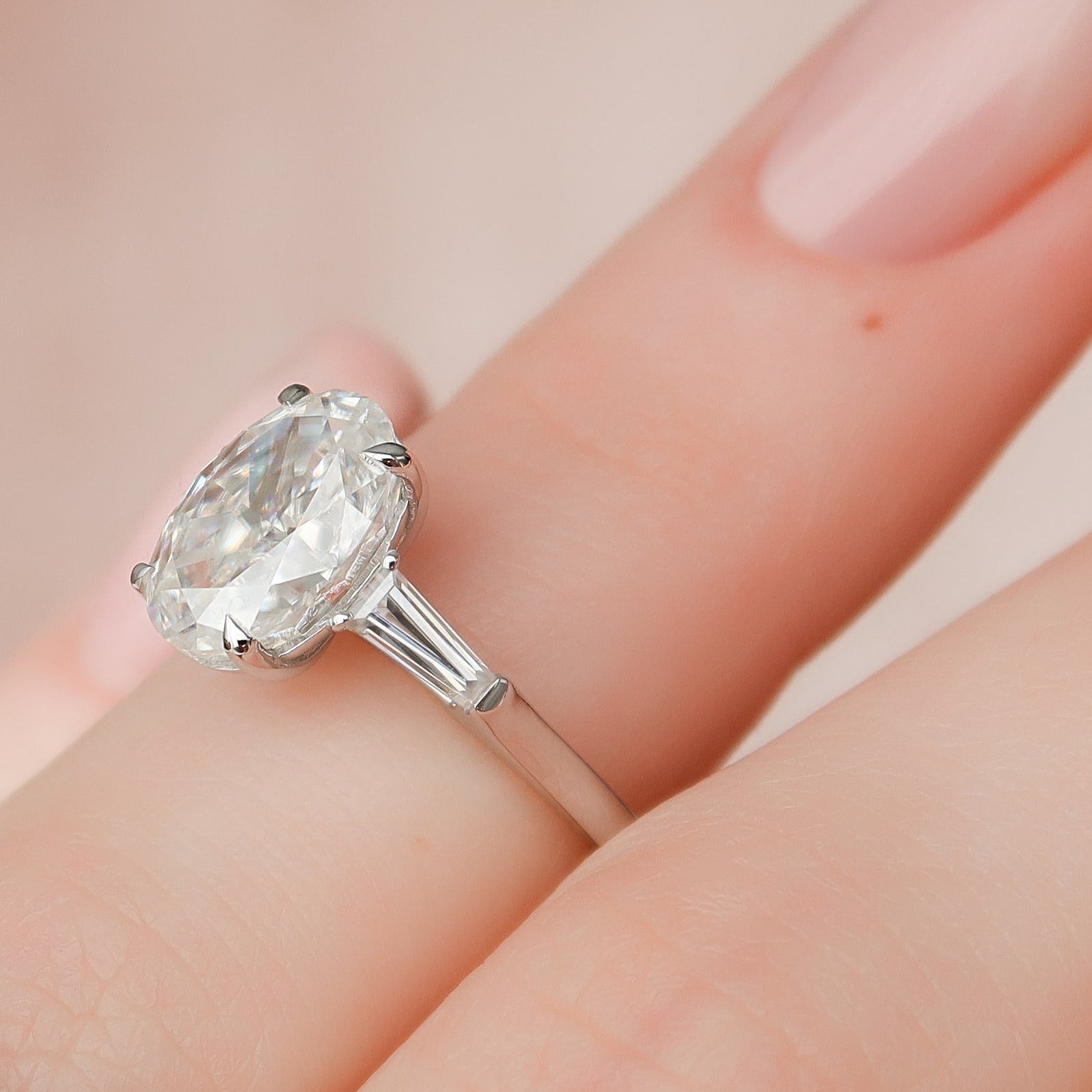  Oval And Tapered Baguette Diamond Ring