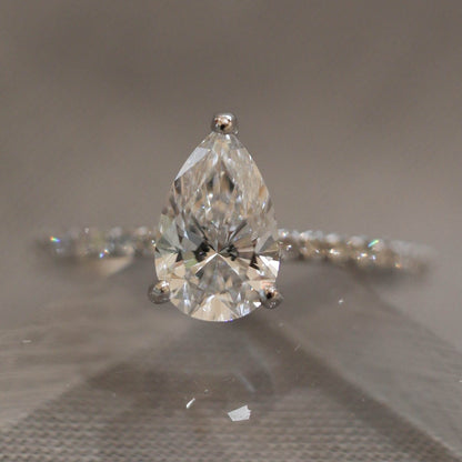 Pear Cut Colorless Claw Prong Set Diamond Ring