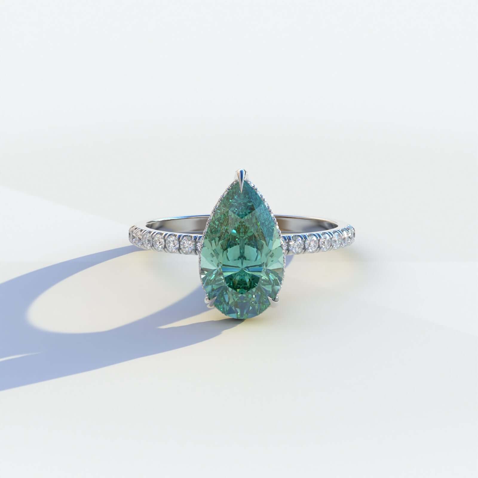 Pear Cut Solitaire Blue Green Moissanite Ring