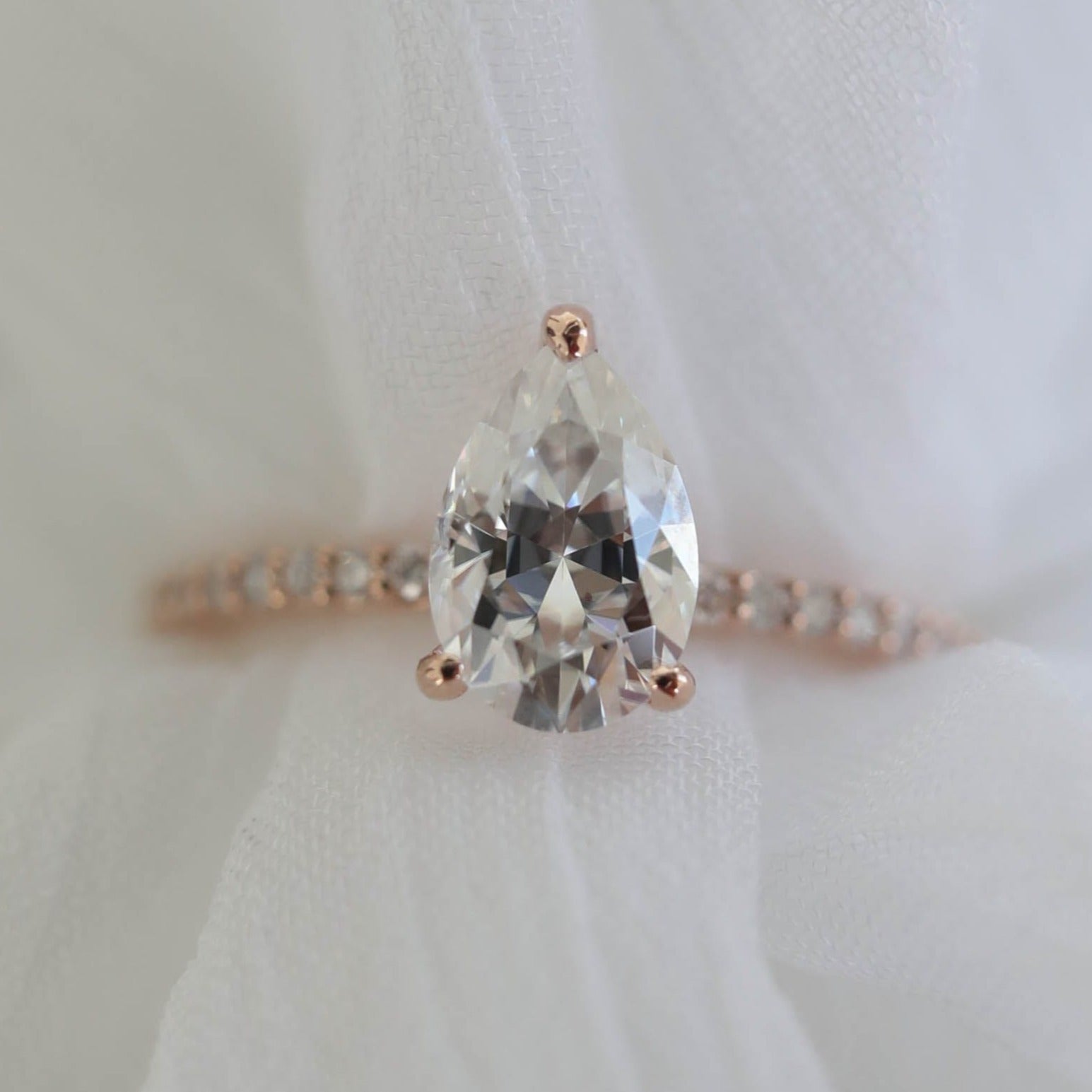 Pear With Round Cut Moissanite Engagement Ring