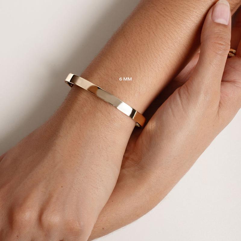 Thin slip on solid gold bangle bracelet